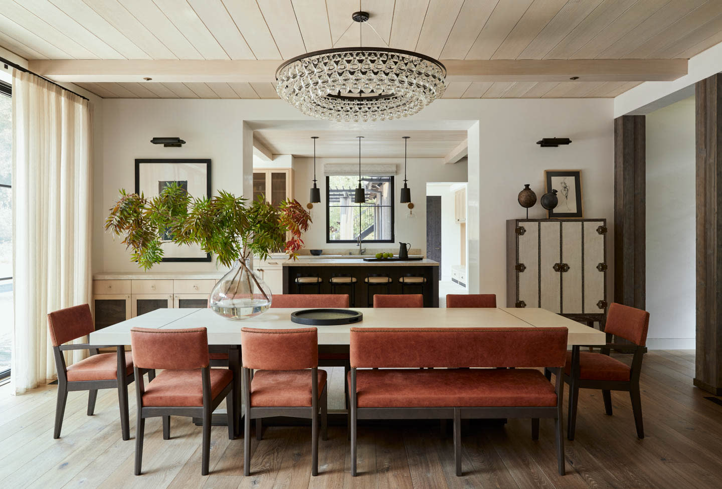grand dining room with red leather seating