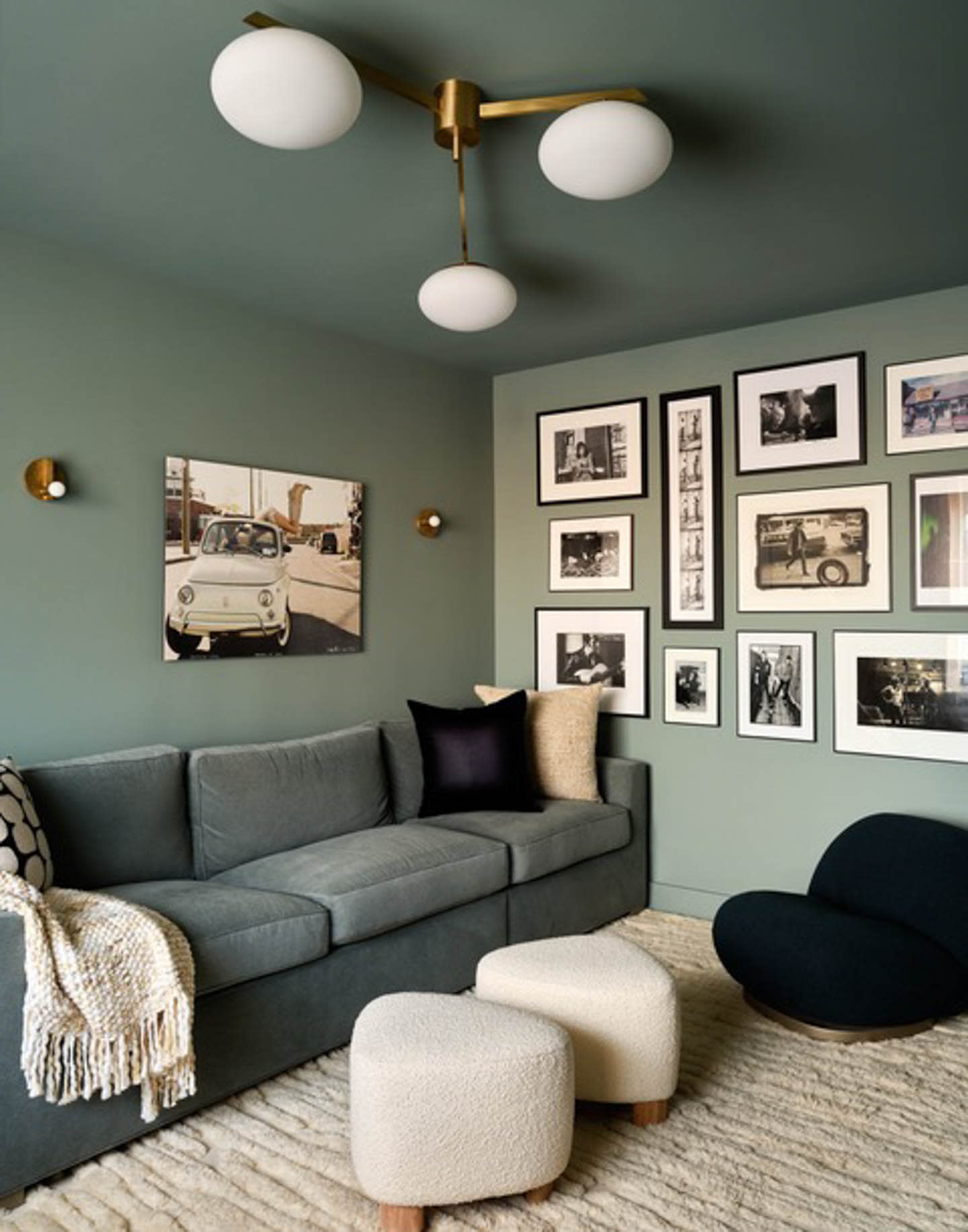sage green living room with gallery wall