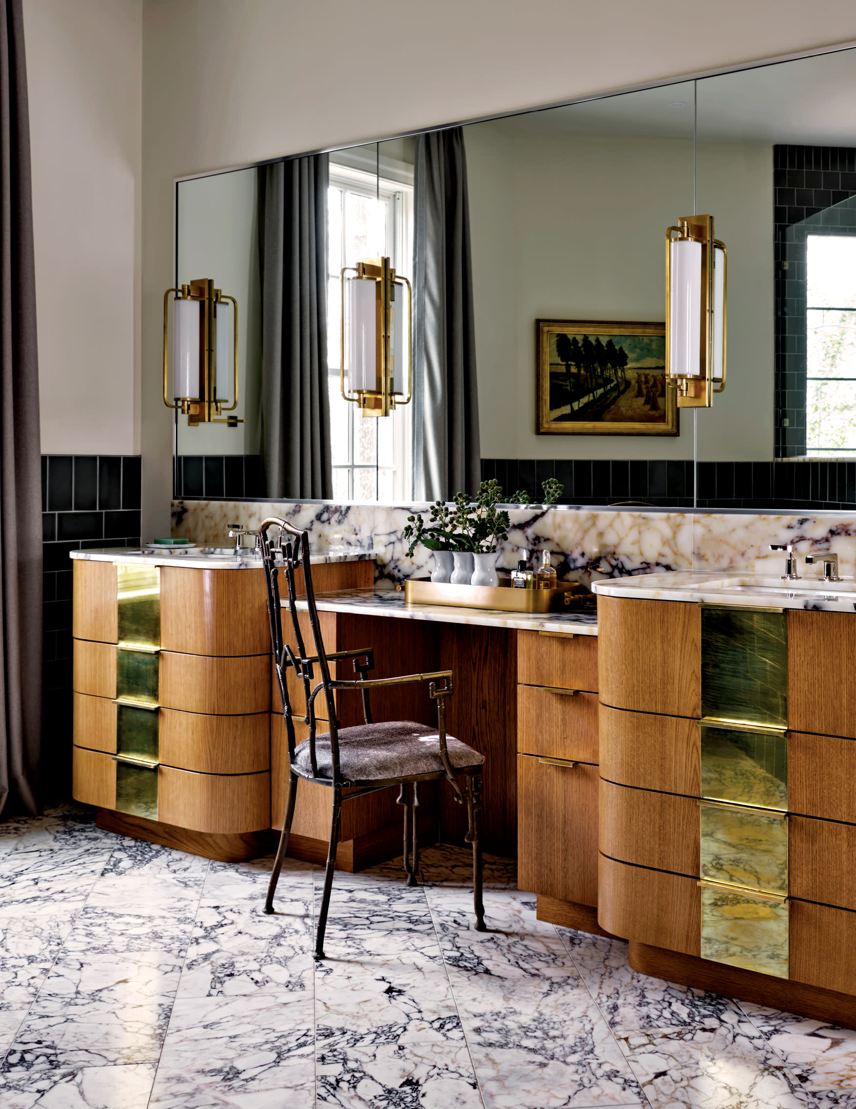 marble flooring matches the top of the vanity in this elegant bathroom
